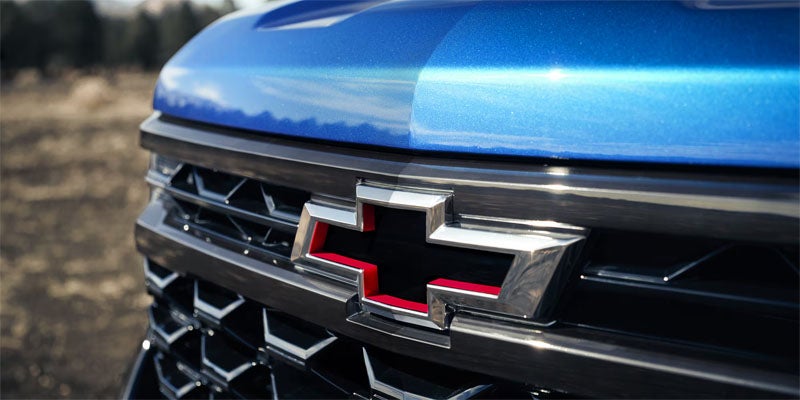 2026 Chevrolet Silverado 1500 front grille in Carthage, MS with Chevrolet emblem prominently displayed