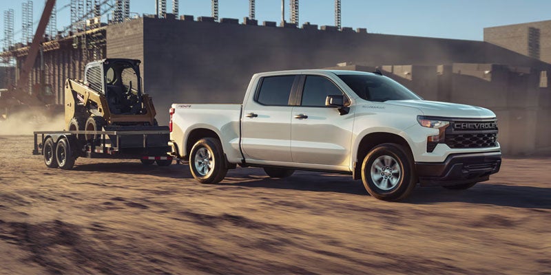 2026 Chevrolet Silverado 1500 in Carthage, MS driving on MS-16 with 6.2L V8 engine and 10-speed automatic transmission for towing and work tasks