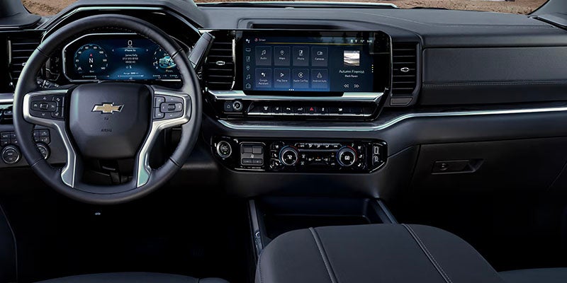 2026 Chevrolet Silverado 2500 cabin in Carthage, MS showing spacious seating for 3 to 6 passengers and storage compartments