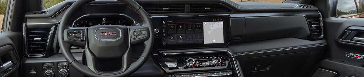 2026 GMC Sierra 1500 infotainment system in Carthage, MS featuring a 13.4-inch touchscreen, Google built-in navigation, Apple CarPlay®, Android Auto®, and seamless connectivity for a modern driving experience.