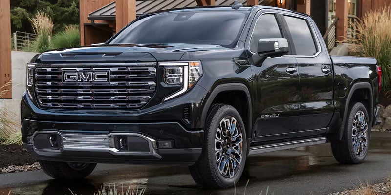 2026 GMC Sierra 1500 front grille in Carthage, MS showcasing bold GMC signature grille design with chrome accents and LED lighting for a striking road presence.