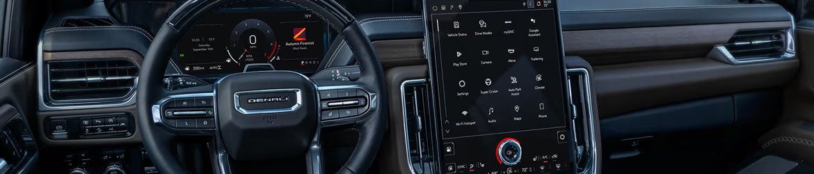 2026 GMC Yukon infotainment system in Carthage, MS featuring a 16.8-inch touchscreen, Google built-in navigation, Apple CarPlay®, Android Auto®, and seamless connectivity for a modern driving experience.