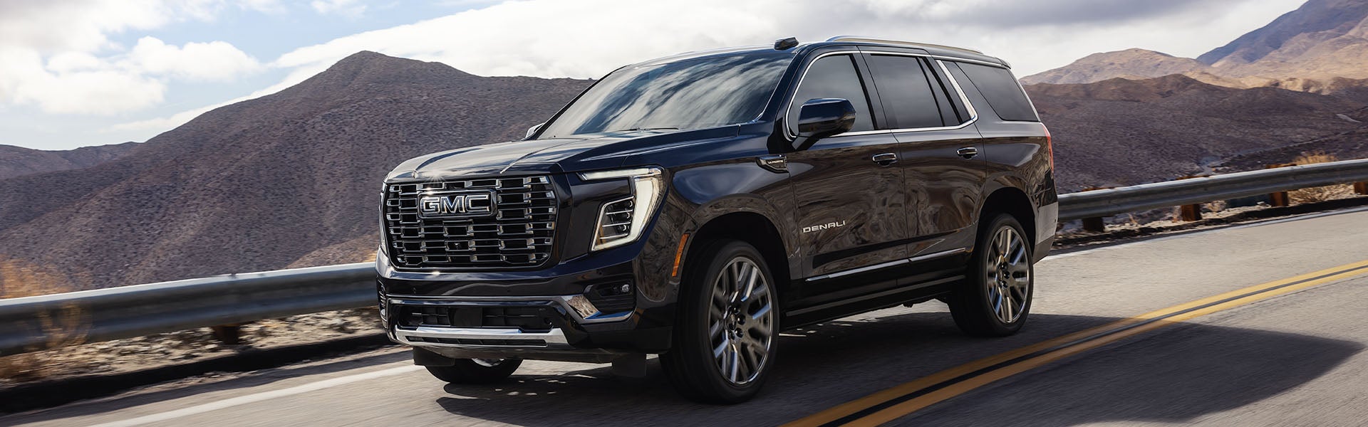 2026 GMC Yukon infotainment system in Carthage, MS featuring a 16.8-inch touchscreen, Google built-in navigation, Apple CarPlay®, Android Auto®, and seamless connectivity for a modern driving experience.