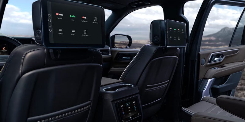 2026 GMC Yukon technology in Carthage MS featuring a 16.8-inch infotainment display with Google built-in, wireless Apple CarPlay, Android Auto, and available Super Cruise hands-free driving on highways